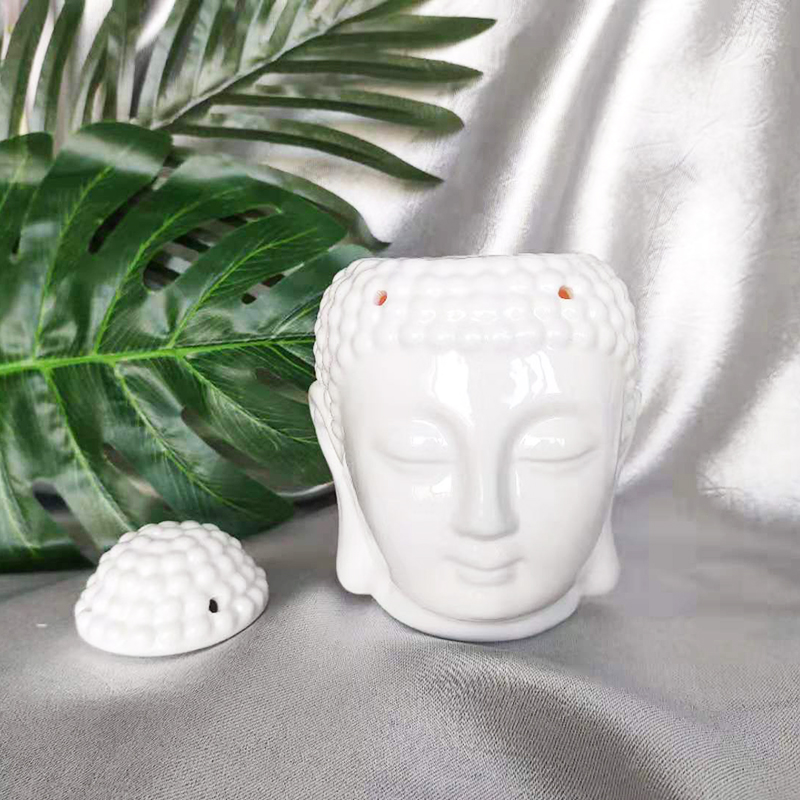 Wholesale white Buddha head ceramic oil burner Australia with customized packaging